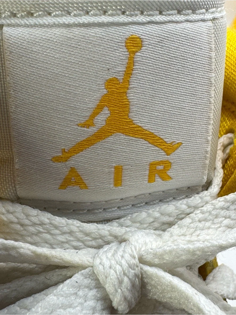 Nike Air Jordan Men’s 9 High Top Sneakers in Yellow and White